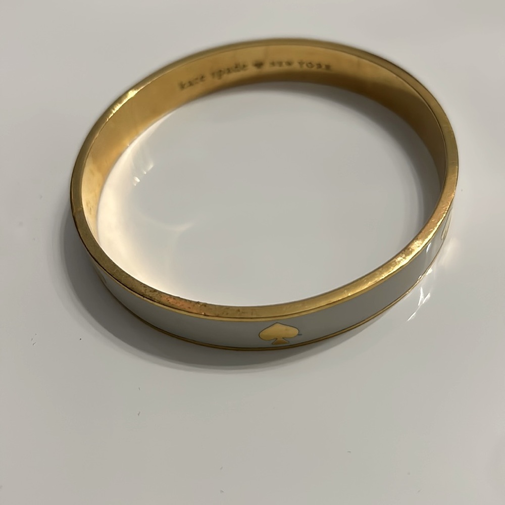 Kate Spade gold ribbon bangle